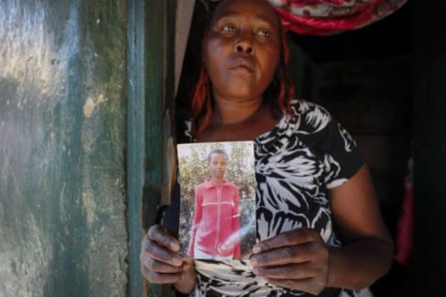 Rose holds a photograph of Agnes at Rose’s house in the Majengo informal settlement in Nanyuki, Kenya