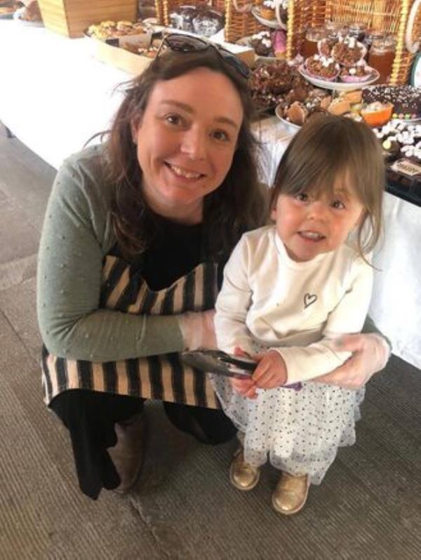 Sara and her mum Diane at the bake sale for Temple Street which raised more than 13k